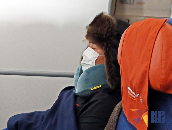 Спецкор «КП» Дарья Асламова: Мой самолет из Пекина в «Шереметьево» встретили люди в скафандрах Спецкор «КП» Дарья Асламова: Мой самолет из Пекина в «Шереметьево» встретили люди в скафандрах