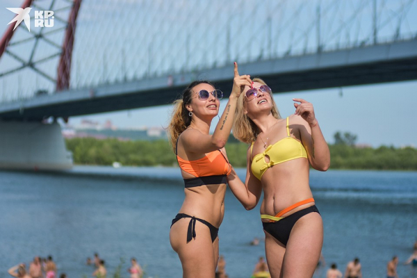 Бикини с видом на Бугринский мост: первые фото с официально открывшихся пляжей в Новосибирске